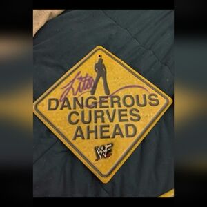 WWE Yellow Sign with Silhouette Graphic